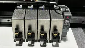 Multiple Die Cutting Heads with Automatic Distance Adjustment