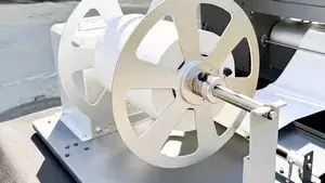 Self-Tension Control Rewinder